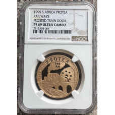 1995 1oz GOLD PROTEA RAILWAYS - SCARCE TYPE 1 WITH FROSTED DOOR & WINDOW - 33.93gr -PF69UC NGC GRADED